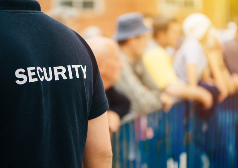 Security Guard monitoring crowd